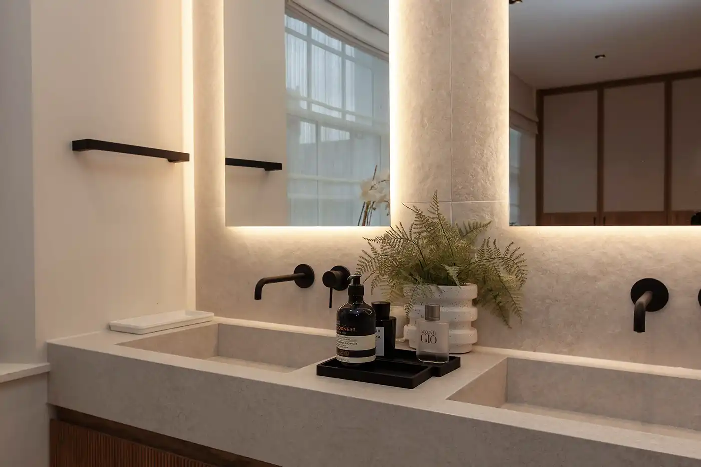 Bathroom interior with balanced tones and understated material palette